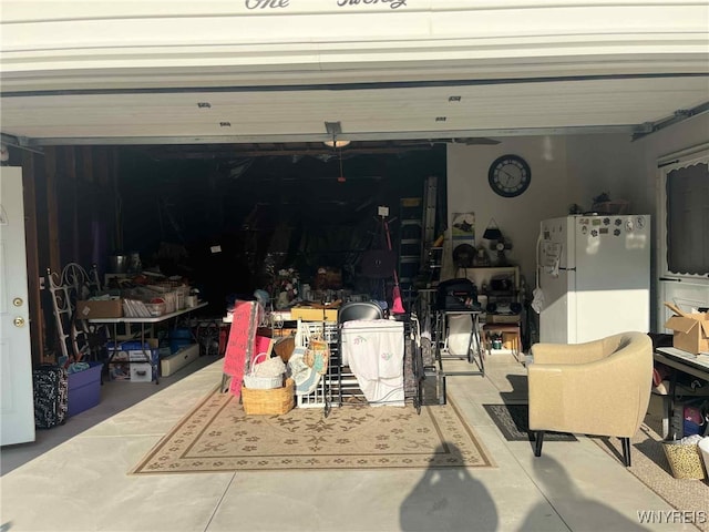 120 Park Lane Cir, Lockport City, NY 14094 - garage with freestanding refrigerator