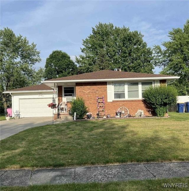 120 Park Lane Cir, Lockport City, NY 14094 - ranch-style home featuring concrete driveway, brick siding, a front lawn, and an attached garage