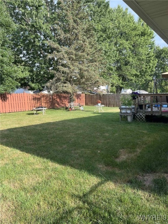 120 Park Lane Cir, Lockport City, NY 14094 - fenced backyard featuring a wooden deck