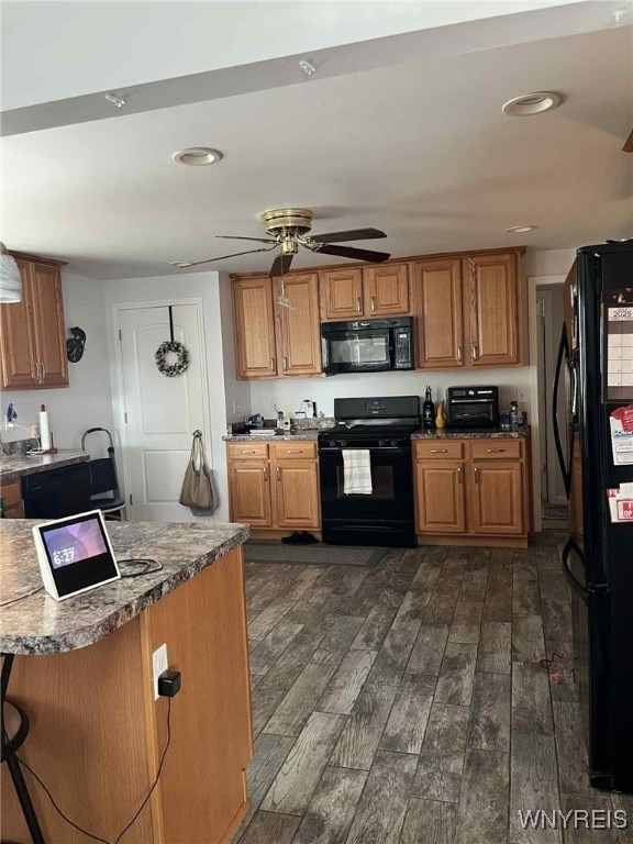120 Park Lane Cir, Lockport City, NY 14094 - kitchen featuring black appliances, dark wood-style floors, brown cabinetry, a ceiling fan, and recessed lighting