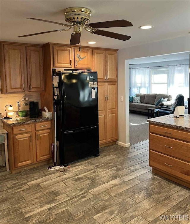 120 Park Lane Cir, Lockport City, NY 14094 - kitchen with freestanding refrigerator, ceiling fan, recessed lighting, wood finished floors, and brown cabinetry