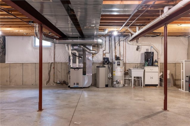 203 Upland Run, Horseheads, NY 14845 - below grade area with water heater, heating unit, and a water softener system