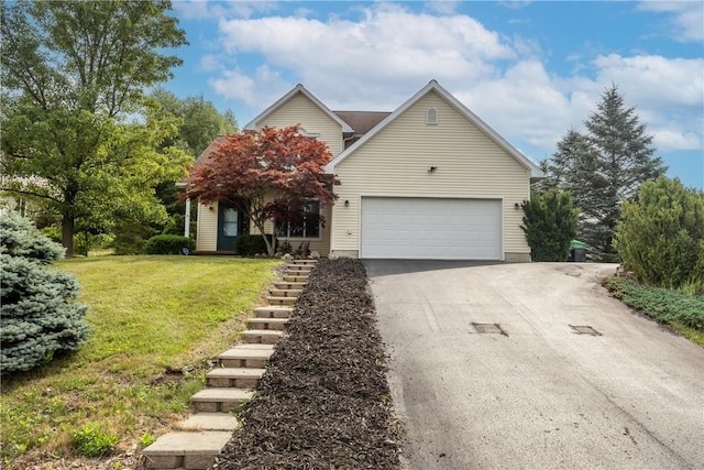203 Upland Run, Horseheads, NY 14845 - view of front of home with asphalt driveway, a front lawn, stairway, and an attached garage