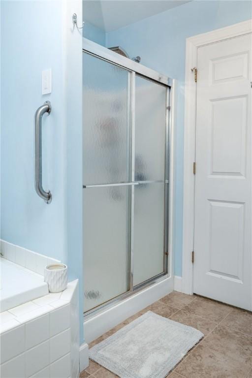 203 Upland Run, Horseheads, NY 14845 - bathroom featuring a shower stall and a tub