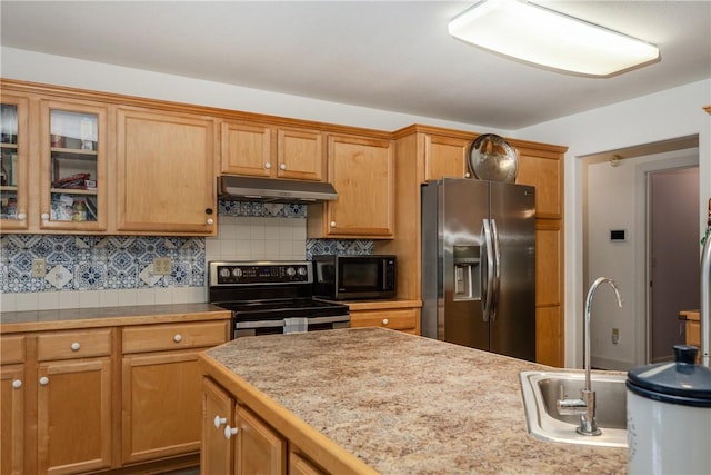 203 Upland Run, Horseheads, NY 14845 - kitchen featuring stainless steel appliances, under cabinet range hood, glass insert cabinets, light countertops, and backsplash