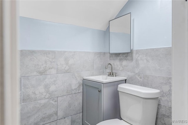 40 Decker St, Buffalo, NY 14215 - bathroom featuring lofted ceiling, vanity, and tile walls