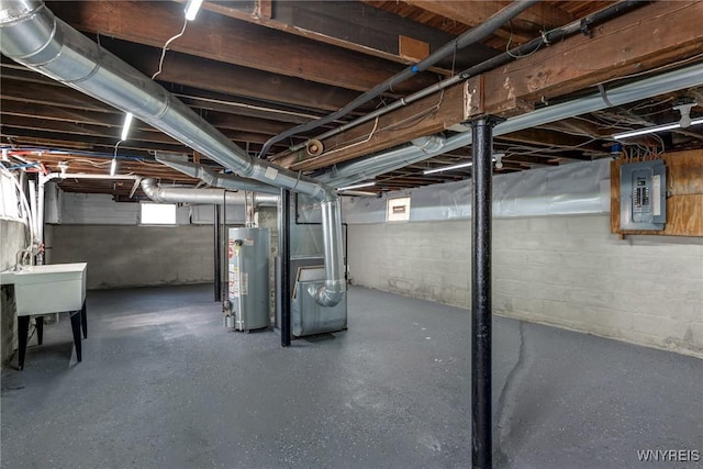 40 Decker St, Buffalo, NY 14215 - below grade area with gas water heater, electric panel, and heating unit