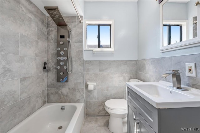 40 Decker St, Buffalo, NY 14215 - full bathroom featuring vanity, tile walls, tub / shower combination, and tile patterned flooring