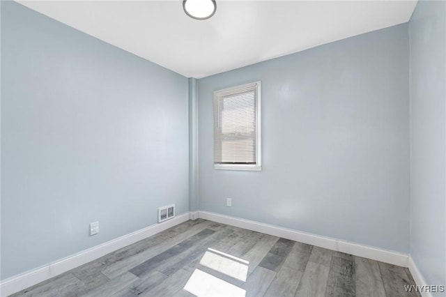 40 Decker St, Buffalo, NY 14215 - unfurnished room with wood finished floors and baseboards