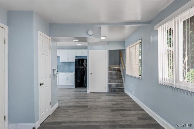 40 Decker St, Buffalo, NY 14215 - hall with healthy amount of natural light, stairs, and dark wood-style floors