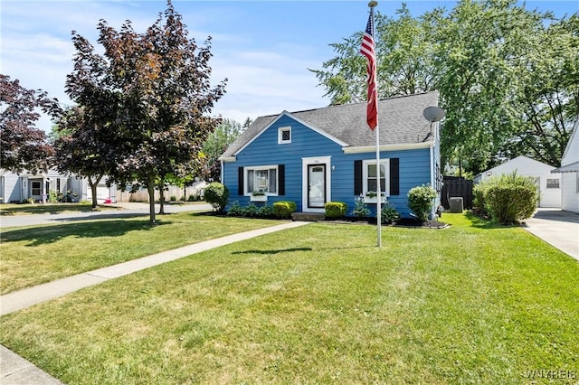 715 Brighton Rd, Tonawanda, NY 14150 - bungalow-style house with a front lawn, a shingled roof, and a garage