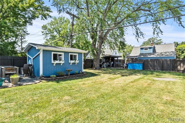 715 Brighton Rd, Tonawanda, NY 14150 - fenced backyard featuring an outdoor structure and a gazebo