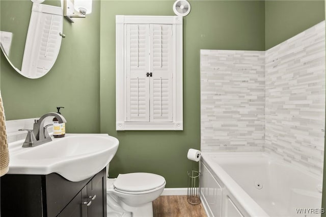 715 Brighton Rd, Tonawanda, NY 14150 - full bathroom featuring vanity and wood finished floors