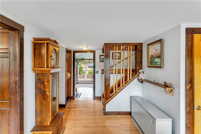 61 Country Pl, Colesville, NY 13813 - hallway featuring light wood-style flooring and stairway