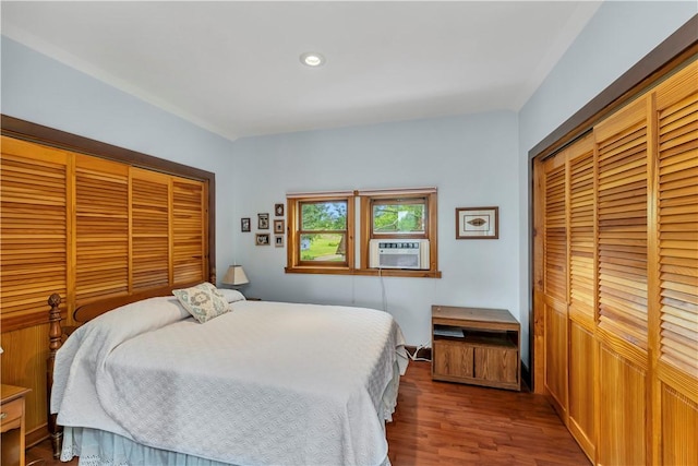 61 Country Pl, Colesville, NY 13813 - bedroom featuring wood finished floors, cooling unit, a closet, and recessed lighting
