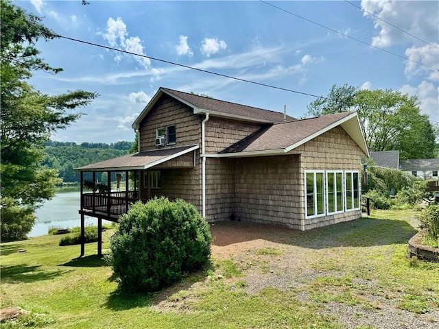61 Country Pl, Colesville, NY 13813 - view of side of property with a yard and a shingled roof
