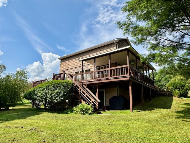 61 Country Pl, Colesville, NY 13813 - back of property with a wooden deck, a lawn, and stairs
