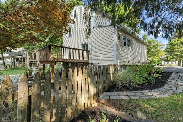 16 Onondaga St, Skaneateles, NY 13152 - view of property exterior with a deck and stairs