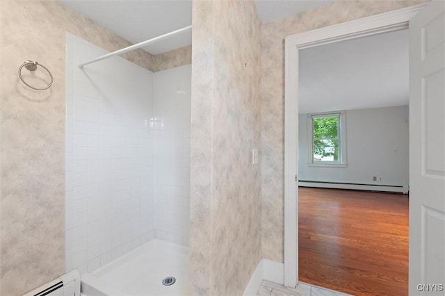 16 Onondaga St, Skaneateles, NY 13152 - bathroom featuring a baseboard heating unit, baseboard heating, and tiled shower