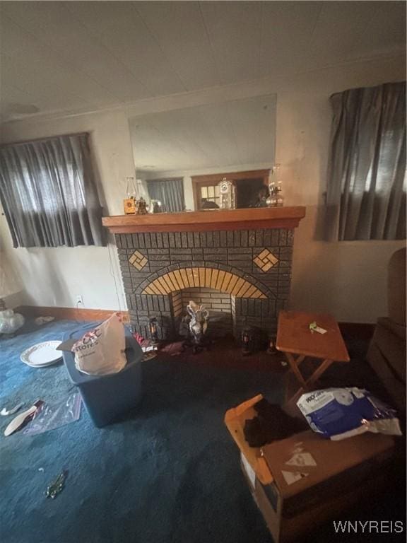 128 Arden Ave, Buffalo, NY 14215 - carpeted living room featuring a brick fireplace