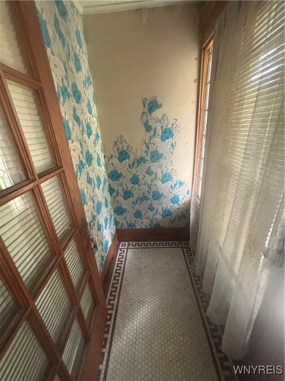 128 Arden Ave, Buffalo, NY 14215 - hallway featuring wallpapered walls and baseboards