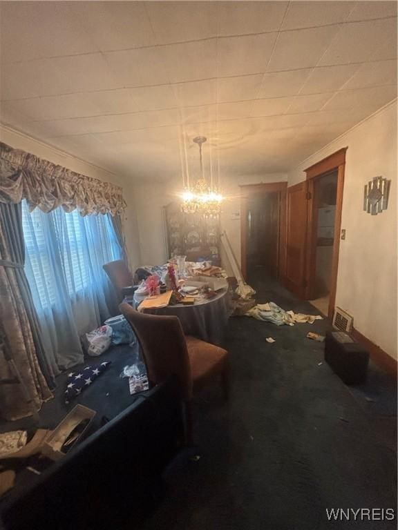 128 Arden Ave, Buffalo, NY 14215 - dining area featuring a chandelier and carpet