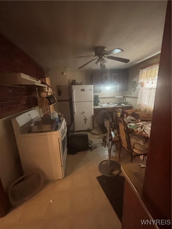 128 Arden Ave, Buffalo, NY 14215 - kitchen featuring freestanding refrigerator, washer / clothes dryer, ceiling fan, and under cabinet range hood