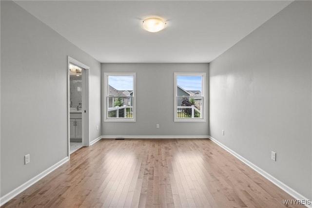 29 Raine Dr, Amherst, NY 14221 - unfurnished room with wood finished floors and baseboards