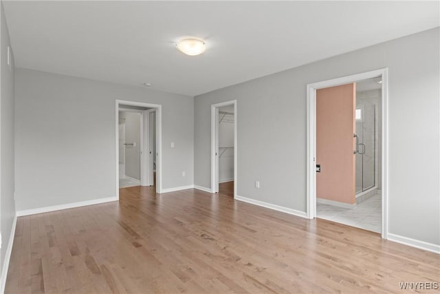 29 Raine Dr, Amherst, NY 14221 - empty room featuring light wood finished floors