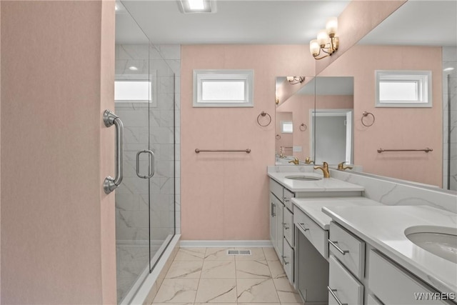 29 Raine Dr, Amherst, NY 14221 - full bath featuring marble finish flooring, double vanity, and a shower stall