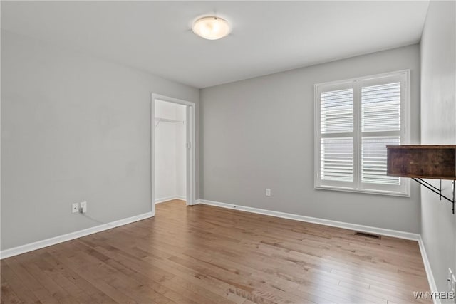 29 Raine Dr, Amherst, NY 14221 - unfurnished room featuring hardwood / wood-style floors