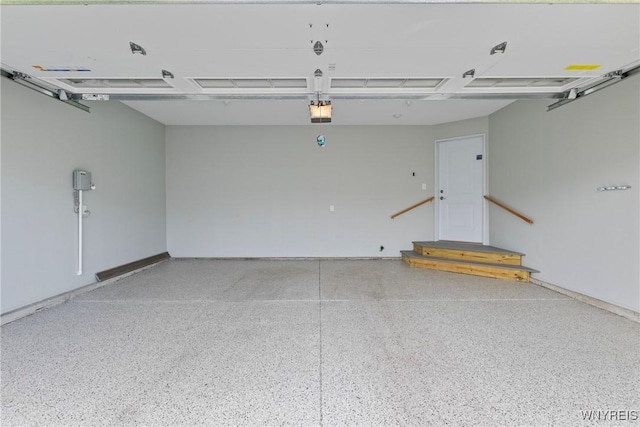 29 Raine Dr, Amherst, NY 14221 - garage featuring a garage door opener