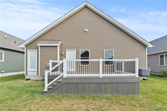 29 Raine Dr, Amherst, NY 14221 - back of property with a lawn and a deck