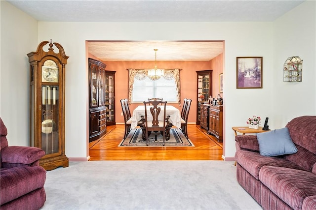 35 Silkwood Cir, Gates, NY 14559 - dining room featuring a chandelier and light colored carpet