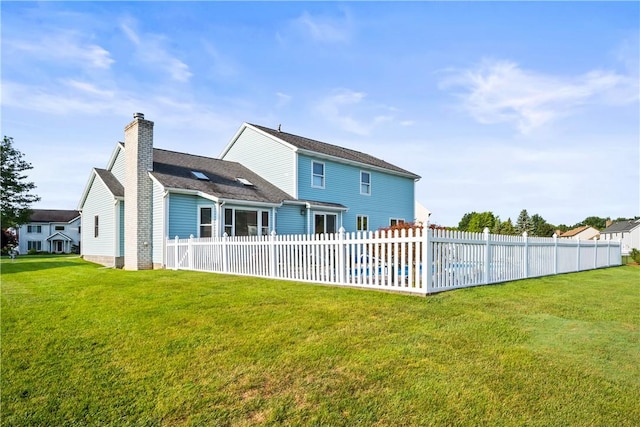 35 Silkwood Cir, Gates, NY 14559 - rear view of property with a chimney