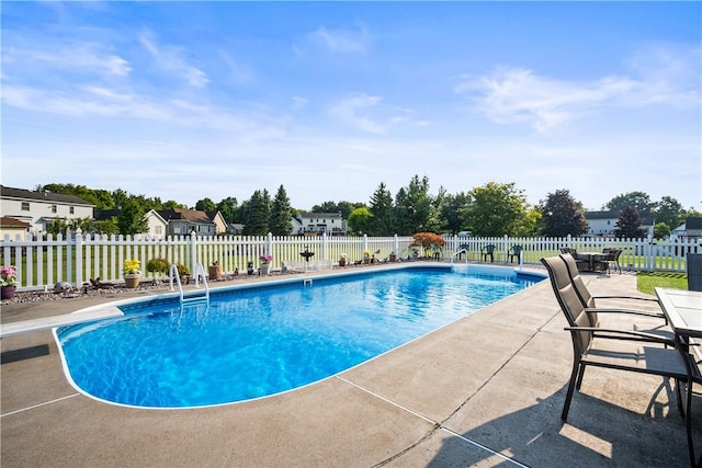 35 Silkwood Cir, Gates, NY 14559 - view of pool featuring a patio area and a diving board