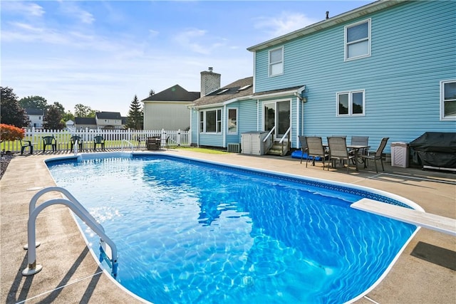 35 Silkwood Cir, Gates, NY 14559 - view of pool with area for grilling, a patio, and a diving board