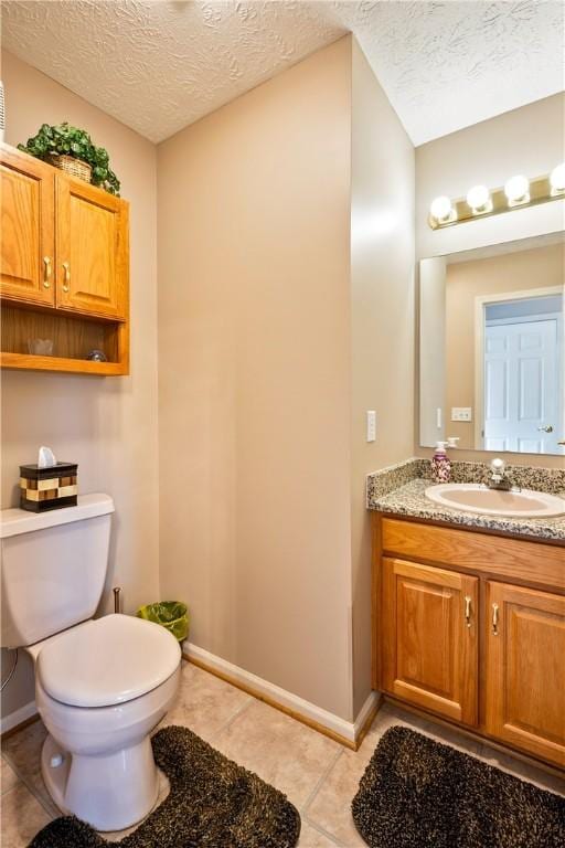 35 Silkwood Cir, Gates, NY 14559 - bathroom featuring tile patterned floors, vanity, and a textured ceiling