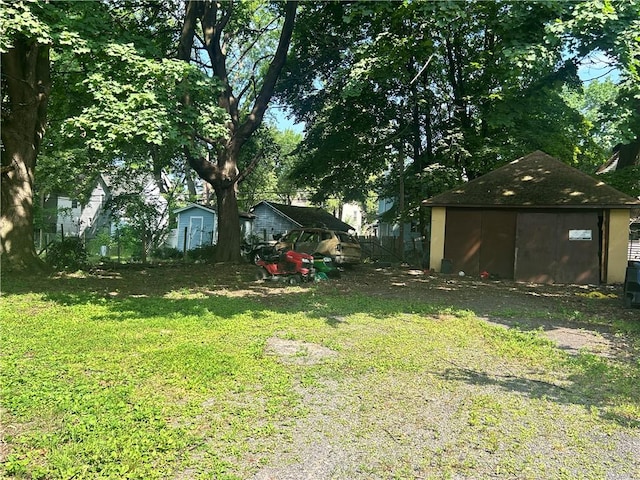 182 Parsells Ave, Rochester, NY 14609 - view of green lawn featuring a storage shed