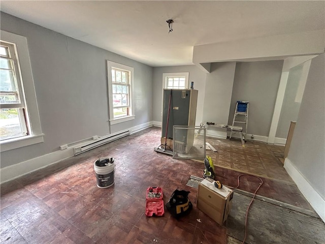 182 Parsells Ave, Rochester, NY 14609 - entryway featuring a baseboard heating unit and baseboards