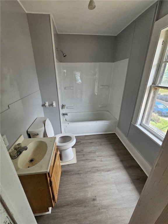 182 Parsells Ave, Rochester, NY 14609 - bathroom featuring vanity, wood finished floors, and shower / washtub combination