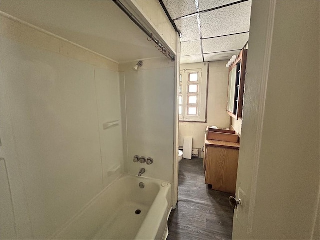 182 Parsells Ave, Rochester, NY 14609 - full bathroom featuring wood finished floors, a paneled ceiling, bathtub / shower combination, and vanity