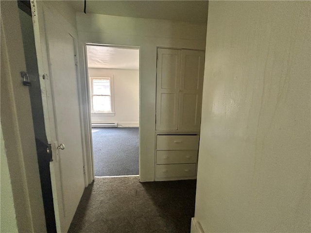182 Parsells Ave, Rochester, NY 14609 - hall featuring dark carpet and a baseboard heating unit