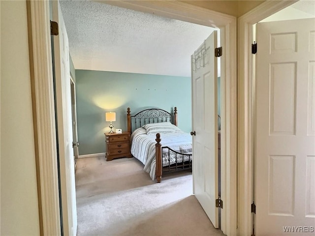 27 Hickory Hill Rd Unit B, Amherst, NY 14221 - bedroom featuring light colored carpet and baseboards