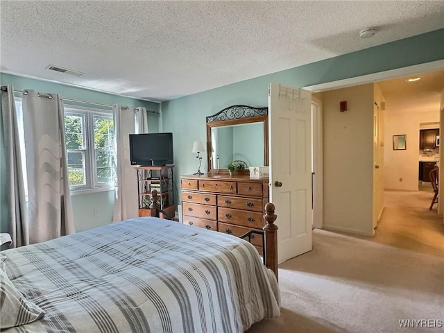 27 Hickory Hill Rd Unit B, Amherst, NY 14221 - bedroom with carpet flooring and a textured ceiling