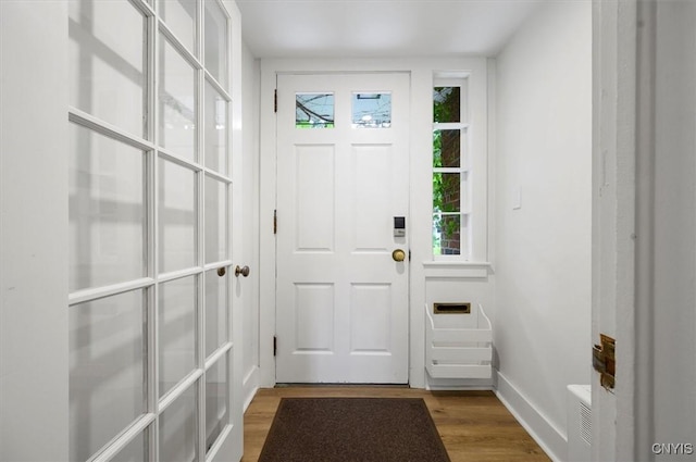 53 Payne St, Hamilton, NY 13346 - foyer entrance featuring light wood finished floors and baseboards