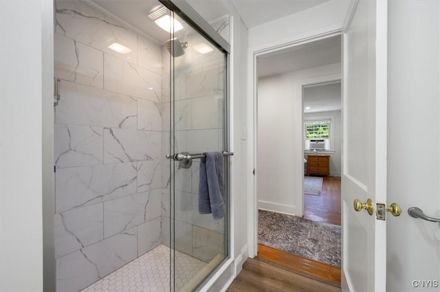 53 Payne St, Hamilton, NY 13346 - bathroom featuring a marble finish shower, wood finished floors, and cooling unit