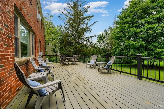 53 Payne St, Hamilton, NY 13346 - deck featuring outdoor dining space and view of wooded area