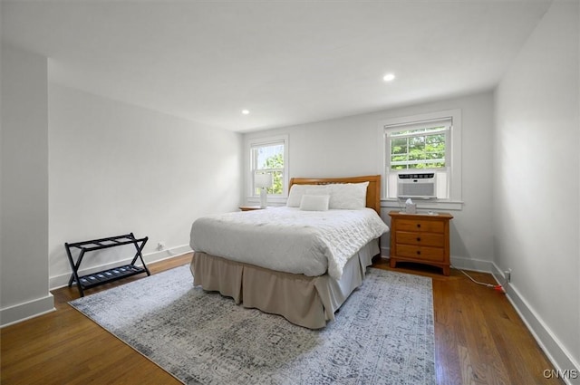 53 Payne St, Hamilton, NY 13346 - bedroom featuring multiple windows, wood finished floors, cooling unit, and recessed lighting