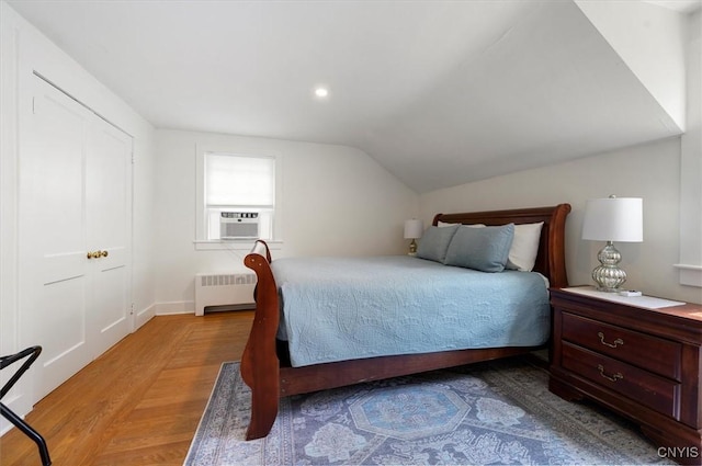 53 Payne St, Hamilton, NY 13346 - bedroom featuring radiator, lofted ceiling, light wood-type flooring, cooling unit, and recessed lighting
